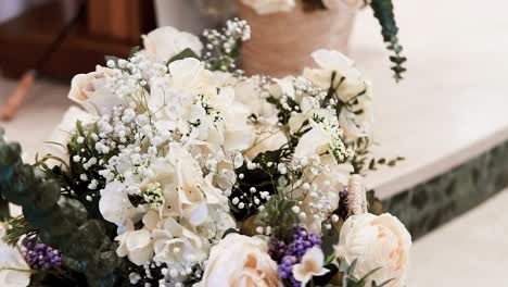 bouquet of white wedding flowers detail shot in slow motion