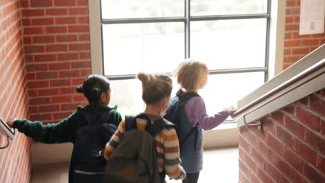 children on school stairs