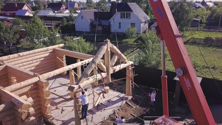 Log Cabin Construction with Crane