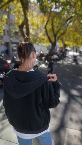 young woman walking in the city