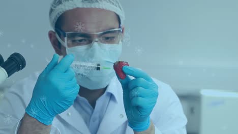 Animación-De-Flores-Flotando-Sobre-Un-Trabajador-De-Laboratorio-Birracial-Con-Una-Muestra