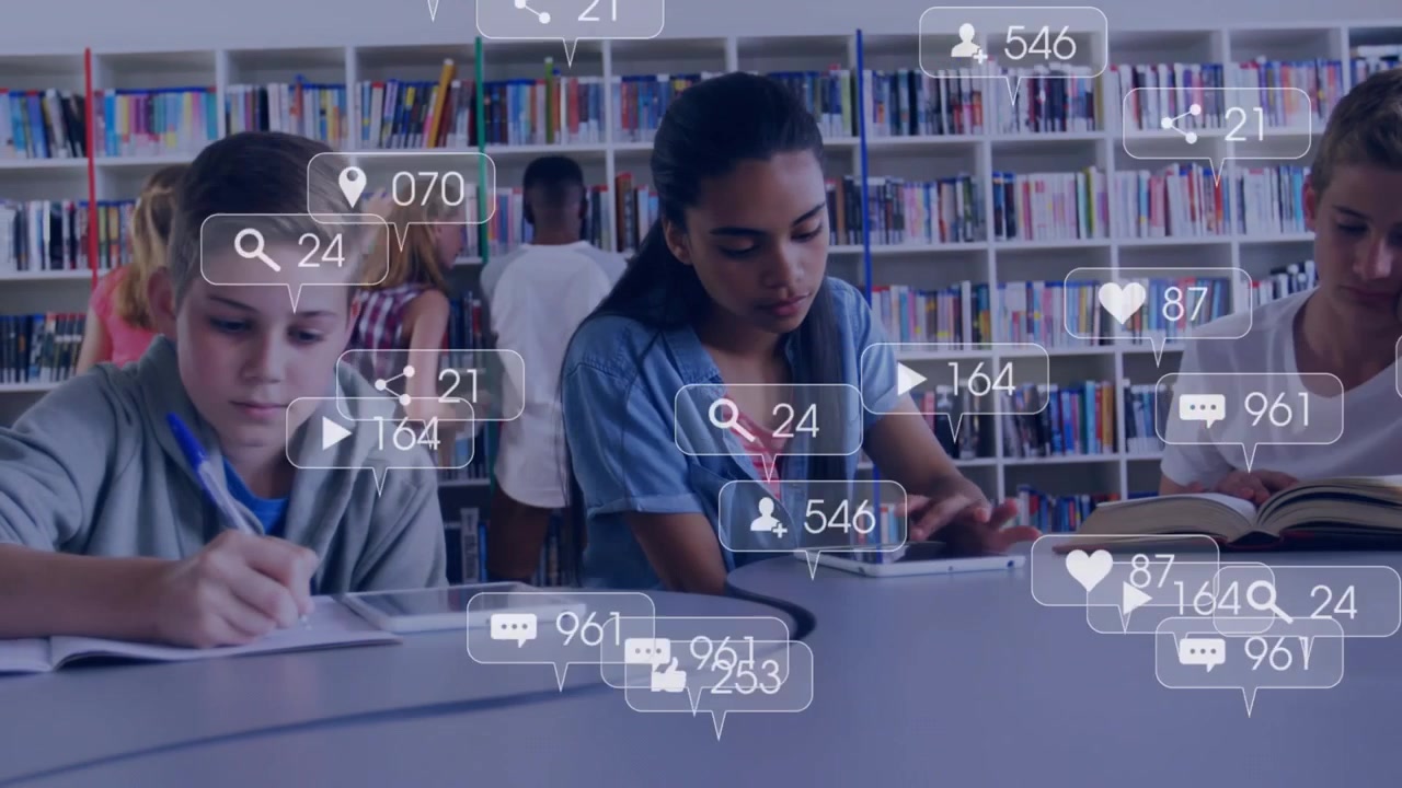 Students Learning in Library with Digital Social Media Overlay