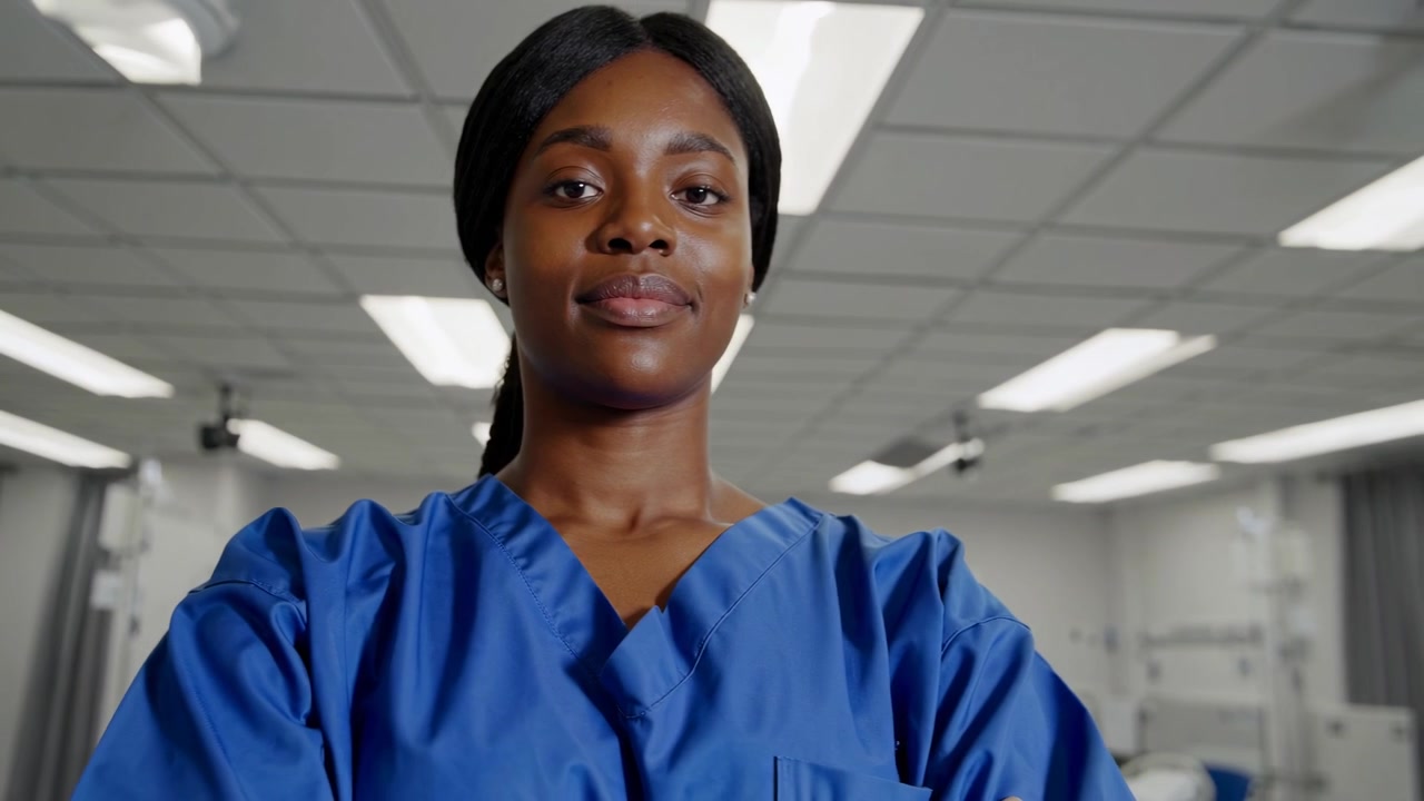 Young African American Nurse Standing Confidently in Hospital Ward