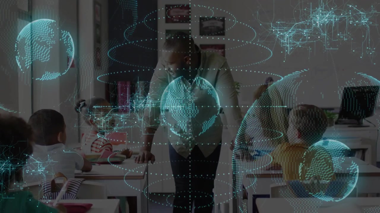 Teacher leaning over student desk, guiding children using pencils with holographic education globes