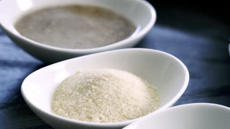 Close-up-zoom-in-shot-of-cane-sugar-and-flax-eggs-to-make-a-healthy-beet-muffin-dessert