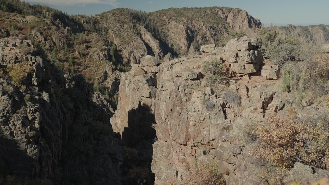 Scenic Canyon Landscape with Rocky Cliffs and Mountains