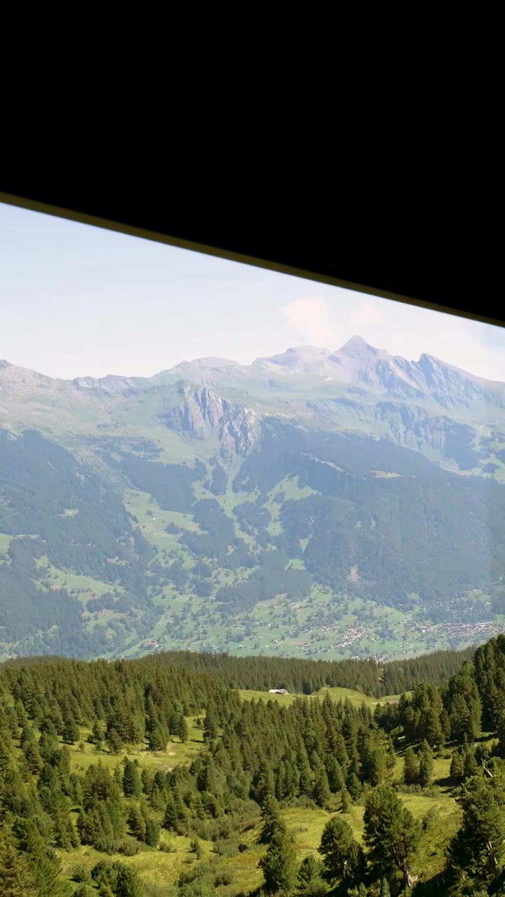 View of Swiss Alps from Moving Cable Car