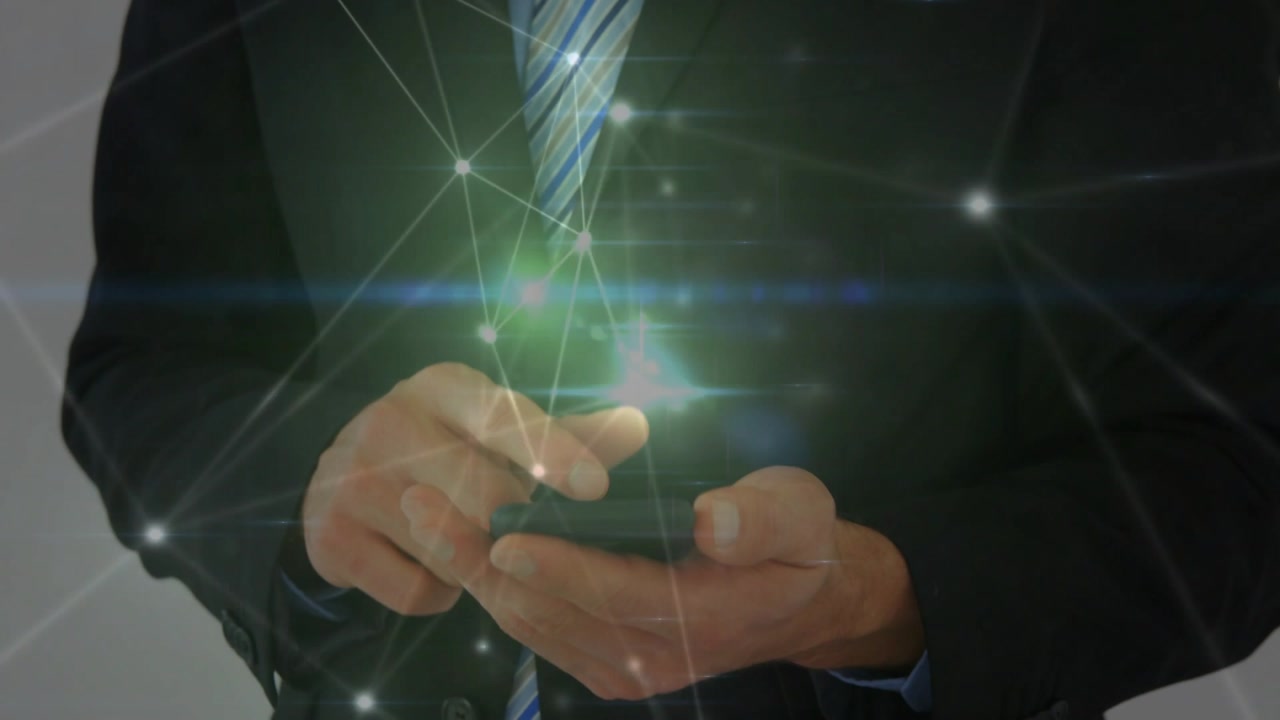 Businessman tapping smartphone, swiping, cradling, presenting device while network nodes glowing