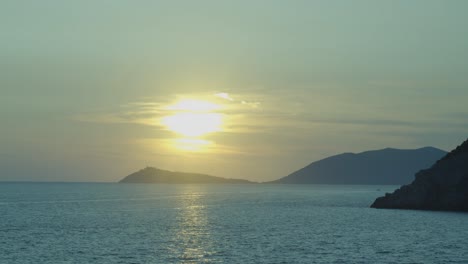 Beautiful-sunrise-over-sea-with-ship-in-the-background