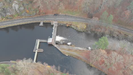 hydroelectric dam in river producing green, clean energy