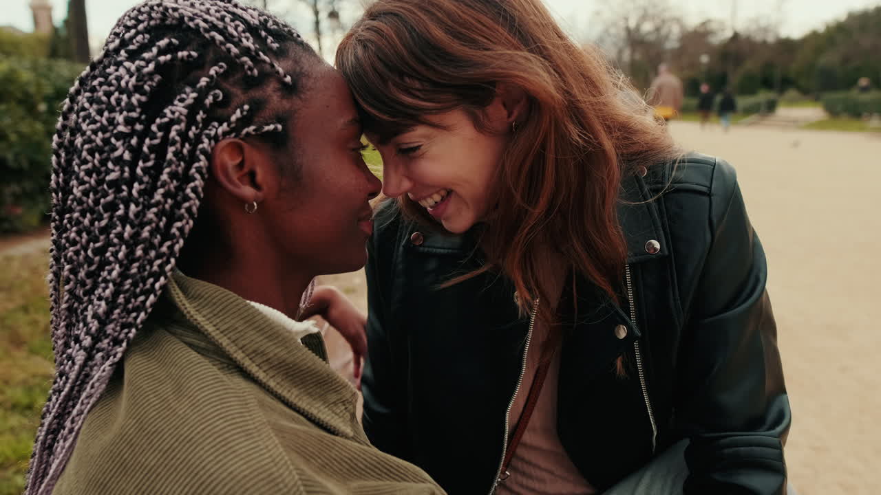 Affectionate Multi-Ethnic Couple Enjoying a Romantic Moment Outdoors