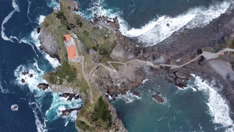 famous gaztelugatxe in the basque country in northern spain at the atlantic ocean, filmed by drone from above