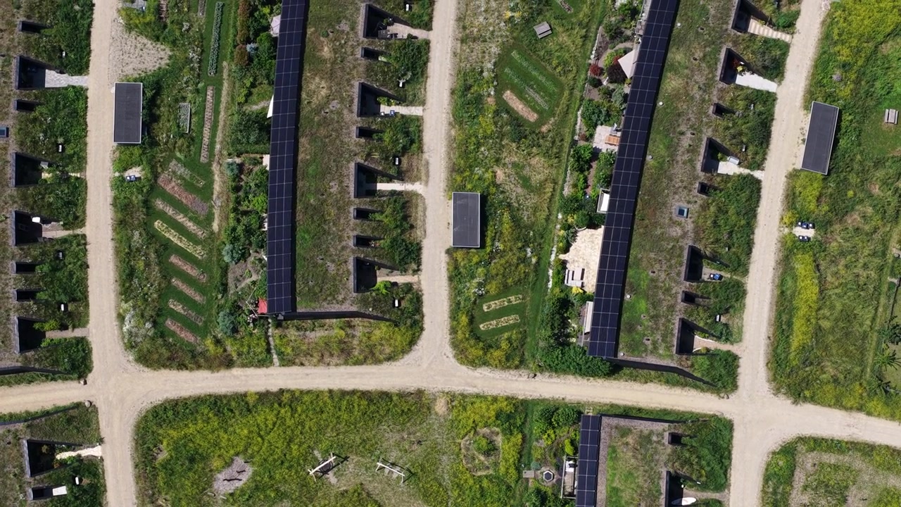 Aerial view of Ecovillage in Almere, the Netherlands, showing sustainable homes, biodiverse landscaping, nature inclusive architecture and climate adaptive residential design.