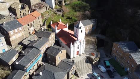 the beautiful village of piódão in portugal, with houses made of shale stone