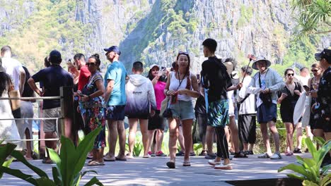 group of people visiting a popular outdoor attraction