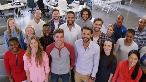 portrait of business team standing together in office