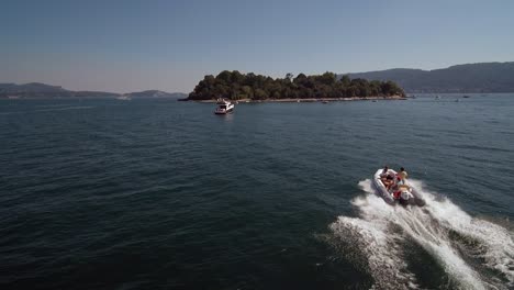 aerial shots of boat in the lake (lago maggiore). filmed in northern italy,