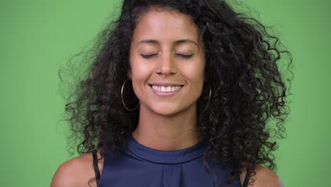 young beautiful hispanic businesswoman relaxing