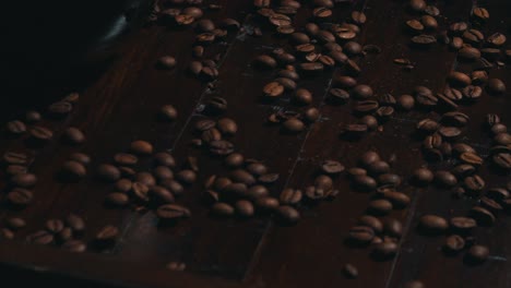 4k slow motion chemex coffee on wooden tray with beans