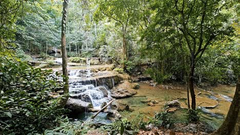 Mesmerizing-Erawan-waterfall-is-cascading-through-the-forest-of-a-National-Park-located-in-Kanchanaburi-in-Thailand