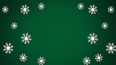 animación de copos de nieve navideños cayendo sobre un fondo verde