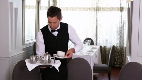 waiter setting the table