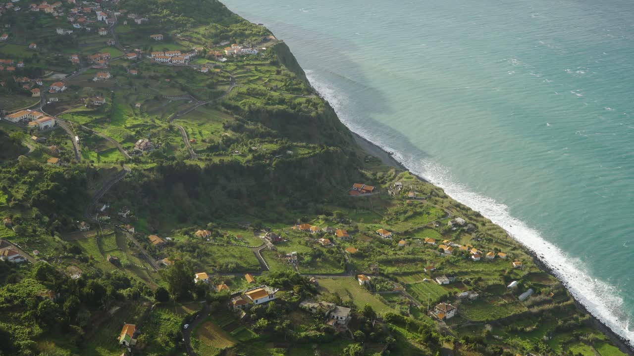 View of Arco de São Jorge parish, a small parish in Santana madeira island, Portugal, This is a small parish divided between the green mountains and the Atlantic shore.