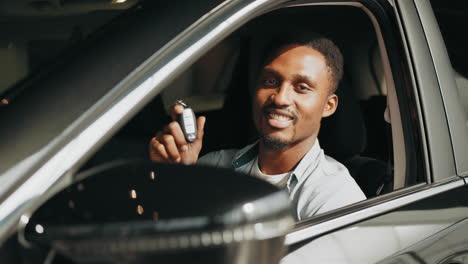 happy man with car keys