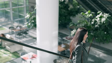 phone call, escalator and business woman talking
