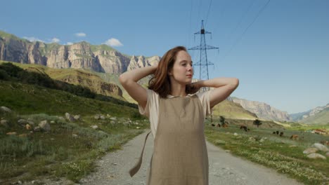 woman walking in a mountainous landscape