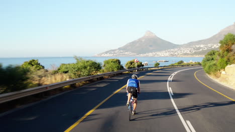 Hombre-Sano-Ciclismo-Bicicleta-De-Carretera-Al-Aire-Libre-Fitness-Steadicam-Shot