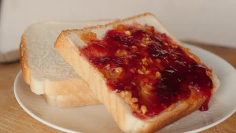 peanut butter and jelly, jam sandwich rotating, turning round, closeup, macro