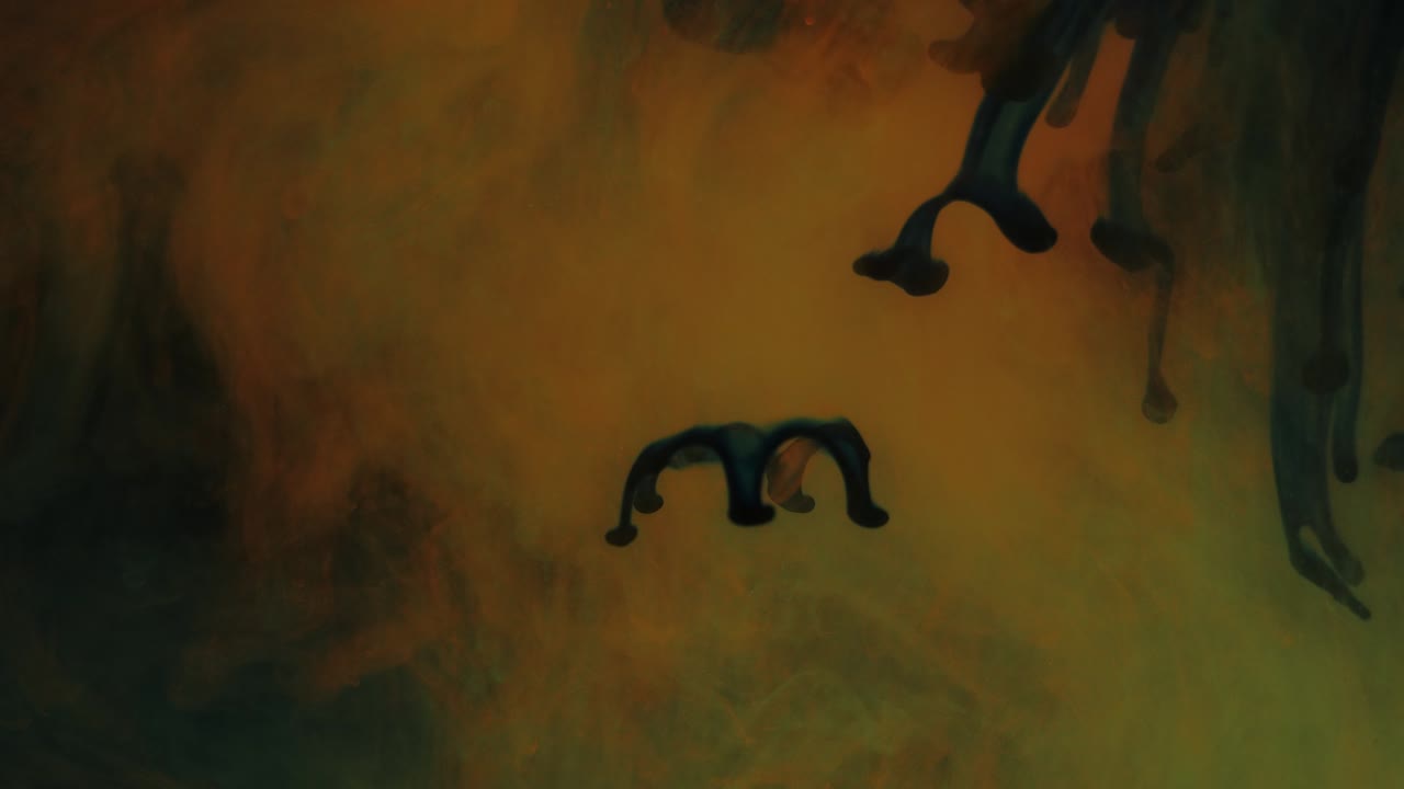 disolución de partículas azules de colores luminosos en un fondo amarillo-verde, en humo.