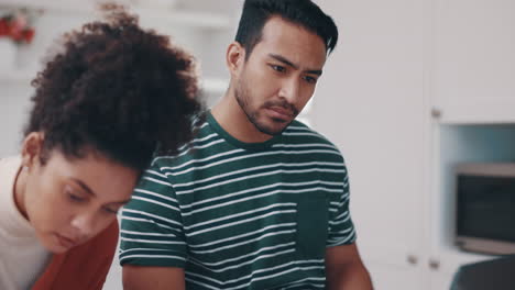 Couple,-thinking-and-planning-on-laptop-with-home