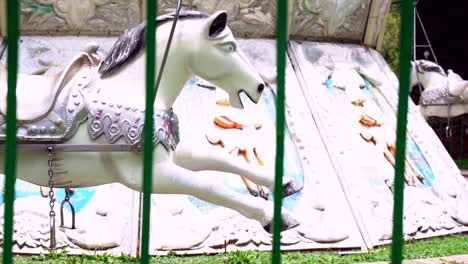 close-up of a white carousel horse