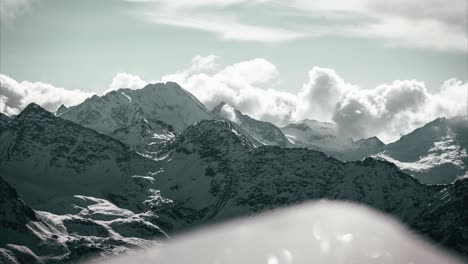 timelapse of a mountain range with moving clouds