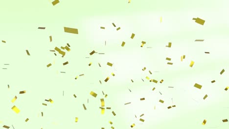 Animation-of-gold-confetti-over-green-background