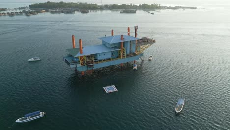 Backwards-Shot-Of-Unique-Blue-Sabah-Celebes-Sea-Diving-Station,-Sabah,-Malaysia