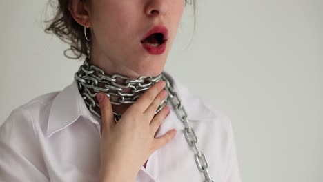 symbolic image of constraint and struggle with a chain around the neck