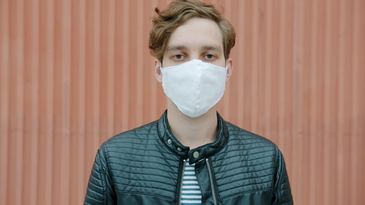 Man Wearing a Mask Outdoors