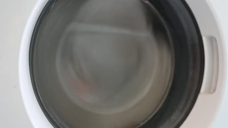 rotating drum washing machine, close up