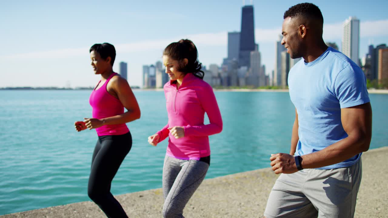 Multi Ethnic male and females exercising in Chicago