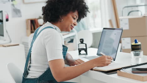 Woman,-laptop-or-notebook-writing-for-logistics