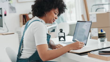 woman, laptop or notebook writing for logistics