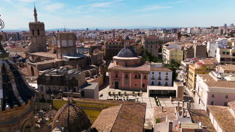 san esteban bell tower and basilica de la virgen de los desamparados at plaza décimo junio bruto in valencia, spain