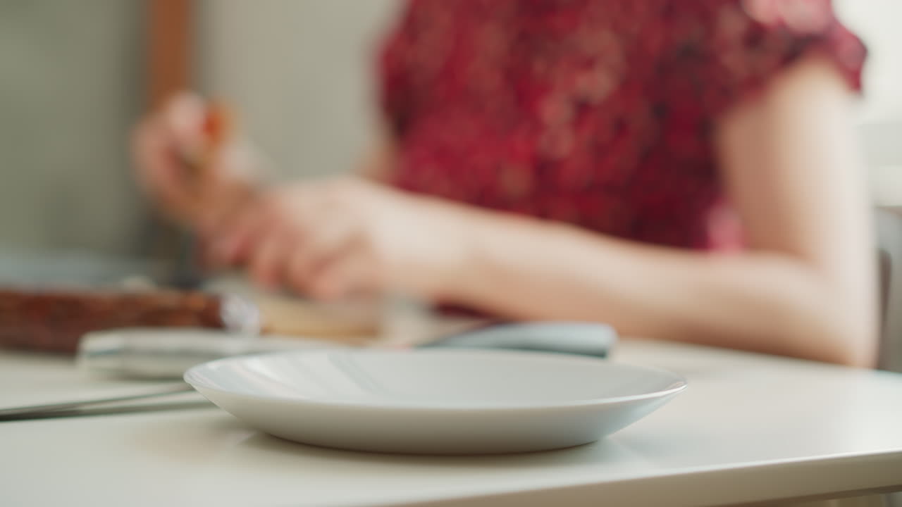 Woman preparing dried meat dish