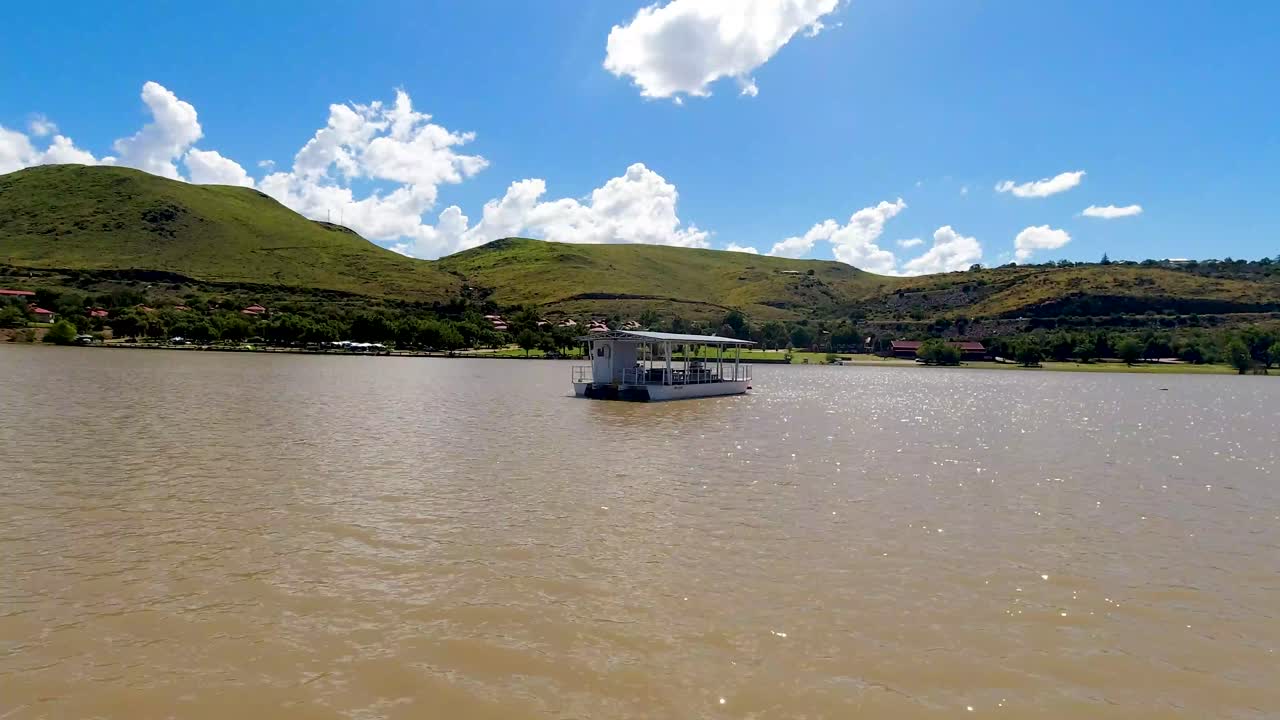 sunset cruise boat on a lake