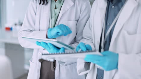 Laboratory,-man-and-woman-with-tablet