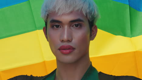 portrait of a person with pride flag