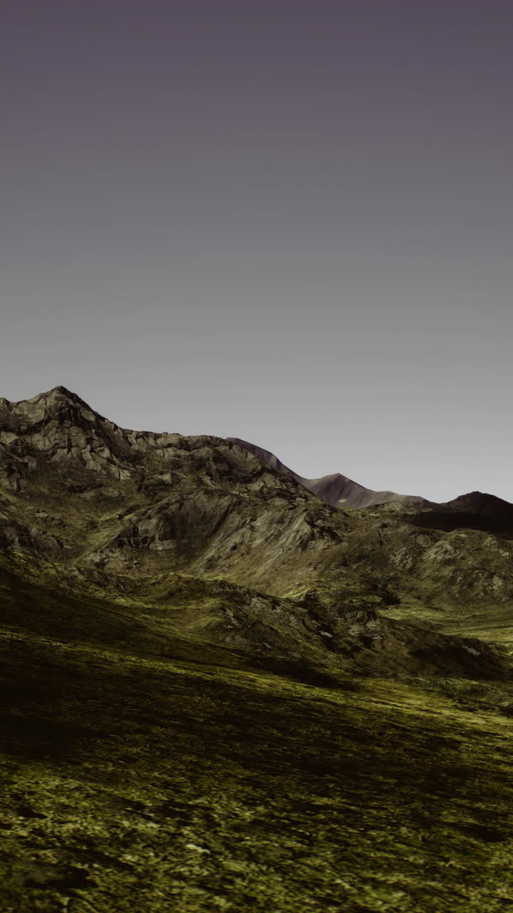 Majestic mountain landscape with vibrant green valley and clear skies